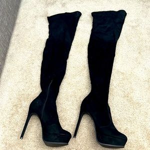Lightly used black thigh high boots